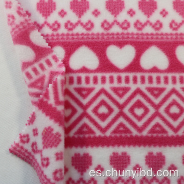 Patrón de corazón rosa de 100 poliéster Ambos laterales Cepillado de un lado Tela de vellón polar estampada antipilosa para ropa de sofá